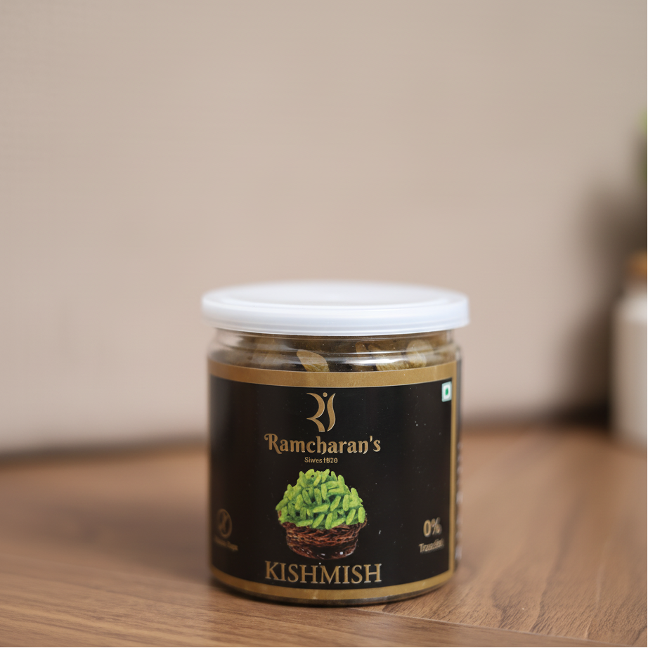 Jar of Ramcharan's Kishmish on a wooden surface with a blurred background